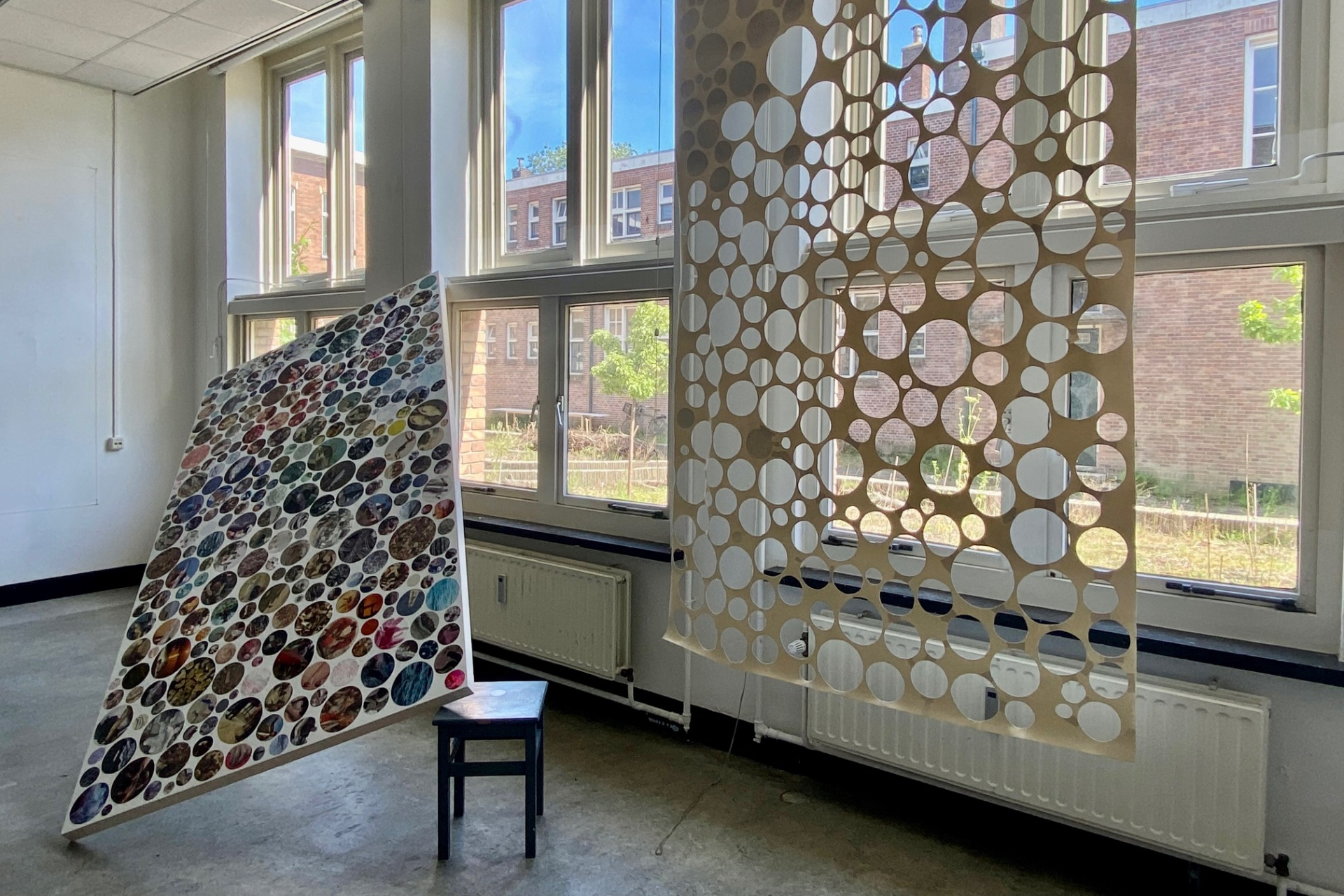 men with fish, 2022, installation with collage and cut out, both 300x150cm, paper and canvas on wood