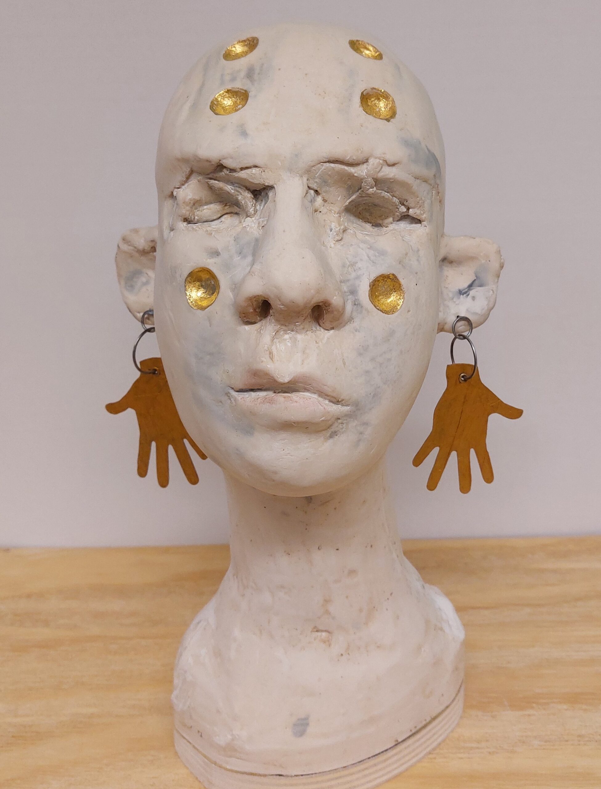 white&gold with open hands