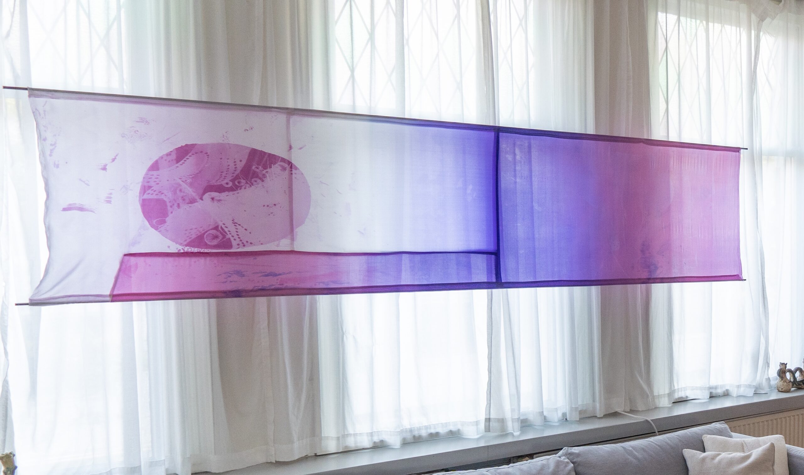 Sheets of skin and metal peel away